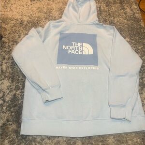 The North Face Women’s Light Blue Logo Hoodie - Never Stop Exploring